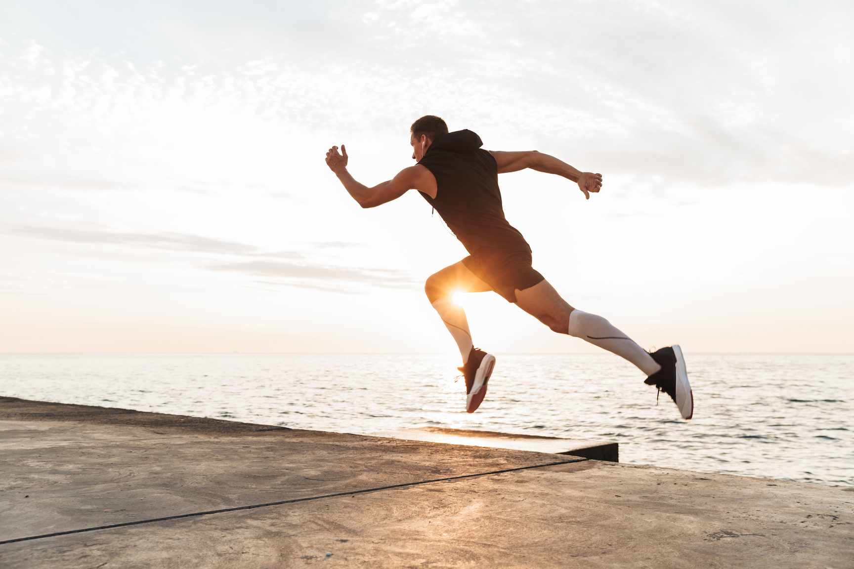 Young Sportsman Running Outdoors